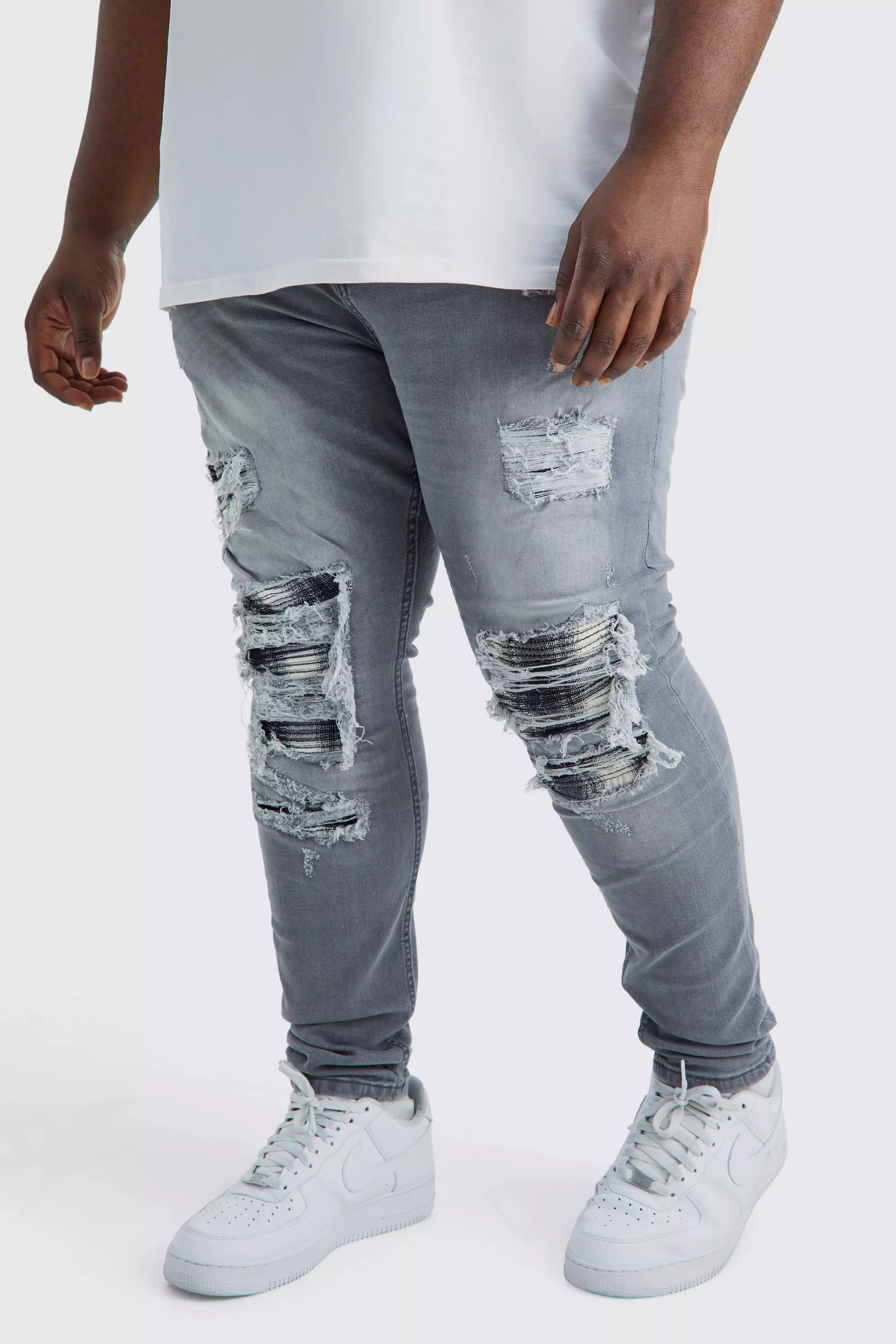 Men's rip and repair best sale skinny jeans